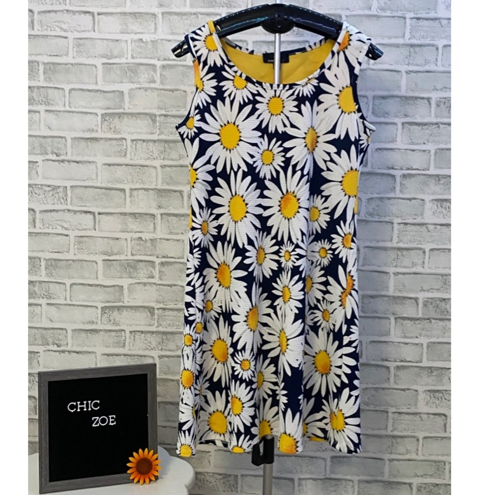 This is a Ronni Nicole dress.
